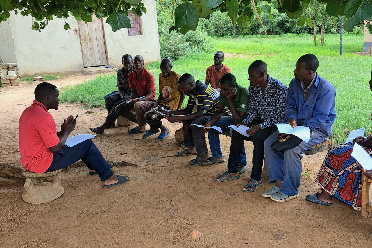 Meetings are held in large groups and check-ins happen for each individual farm. Leaders share devotions, pray, and encourage the farmers through God's word.